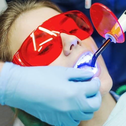 Patient receiving cosmetic dental bonding