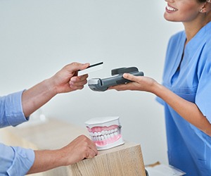 A patient smiling during her cosmetic dental visit in North Naples, FL