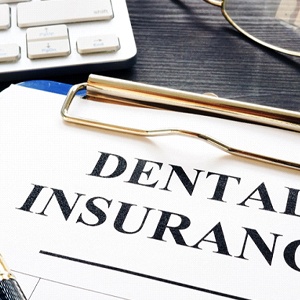Insurance paperwork for the cost of dental implants in Naples