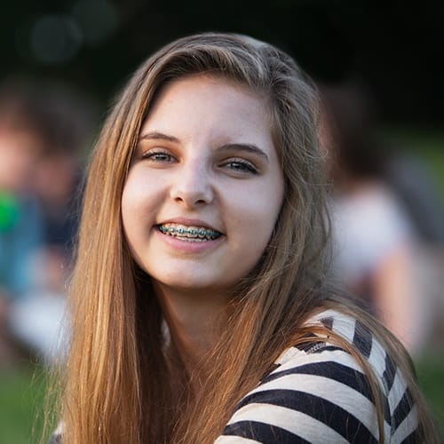 Teen girl with traditional braces