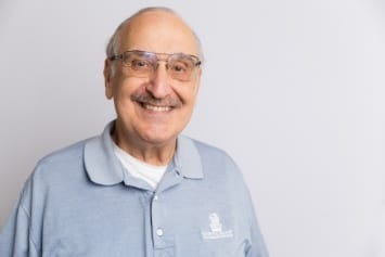 Dental patient smiling after periodontal therapy