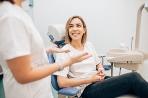 happy woman smiling at dentist